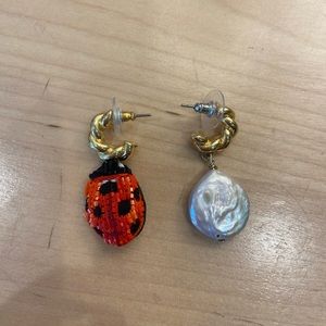 Mignonne Gavigan mis matched earrings